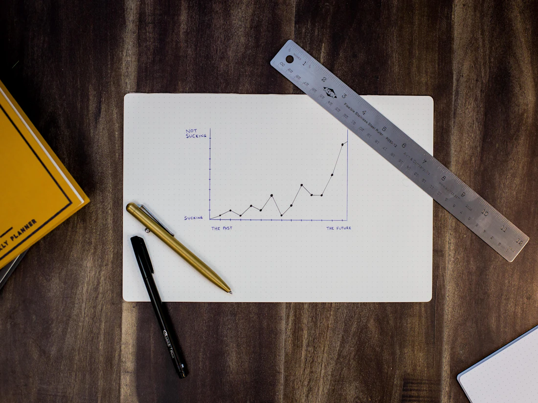 Analytics reports and conversion tracking charts reviewed on a laptop
