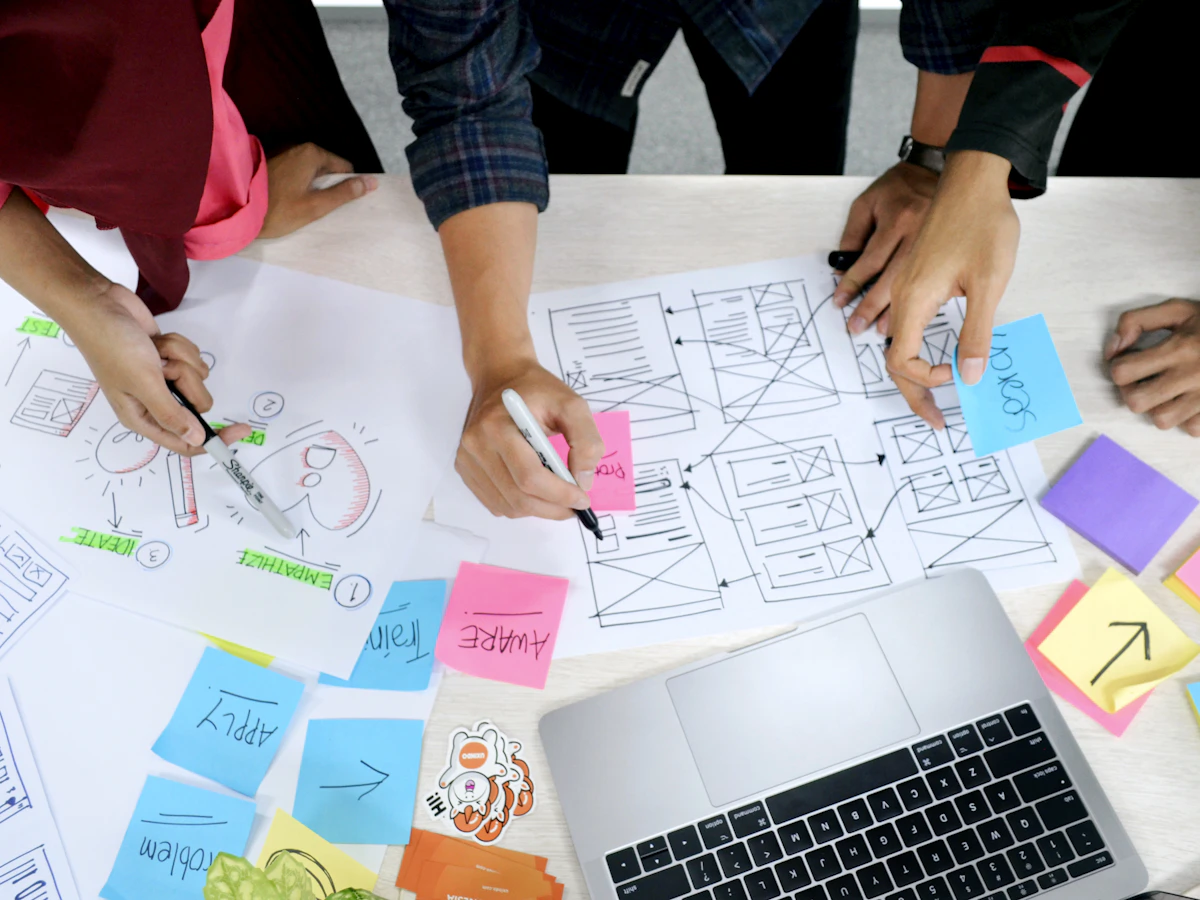 UI UX designer working on interface wireframes and screen layouts in Figma